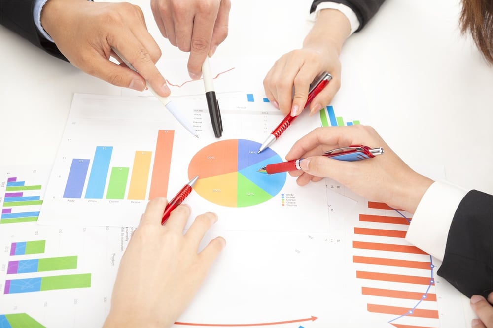 Image of Business People Reviewing Data